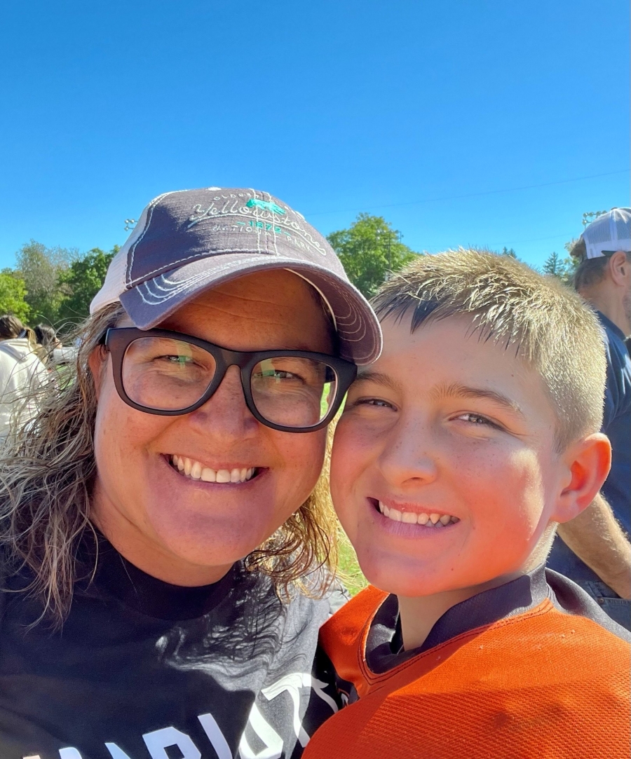 Becky and her son smiling for a photo